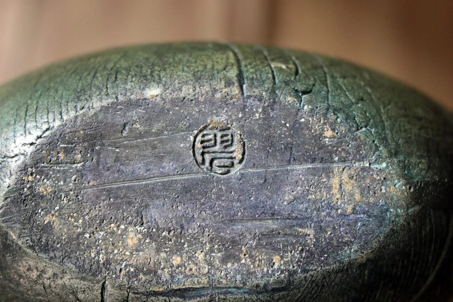 A Burnished Jade Green Bottle Vase by Peter Hayes c.1984