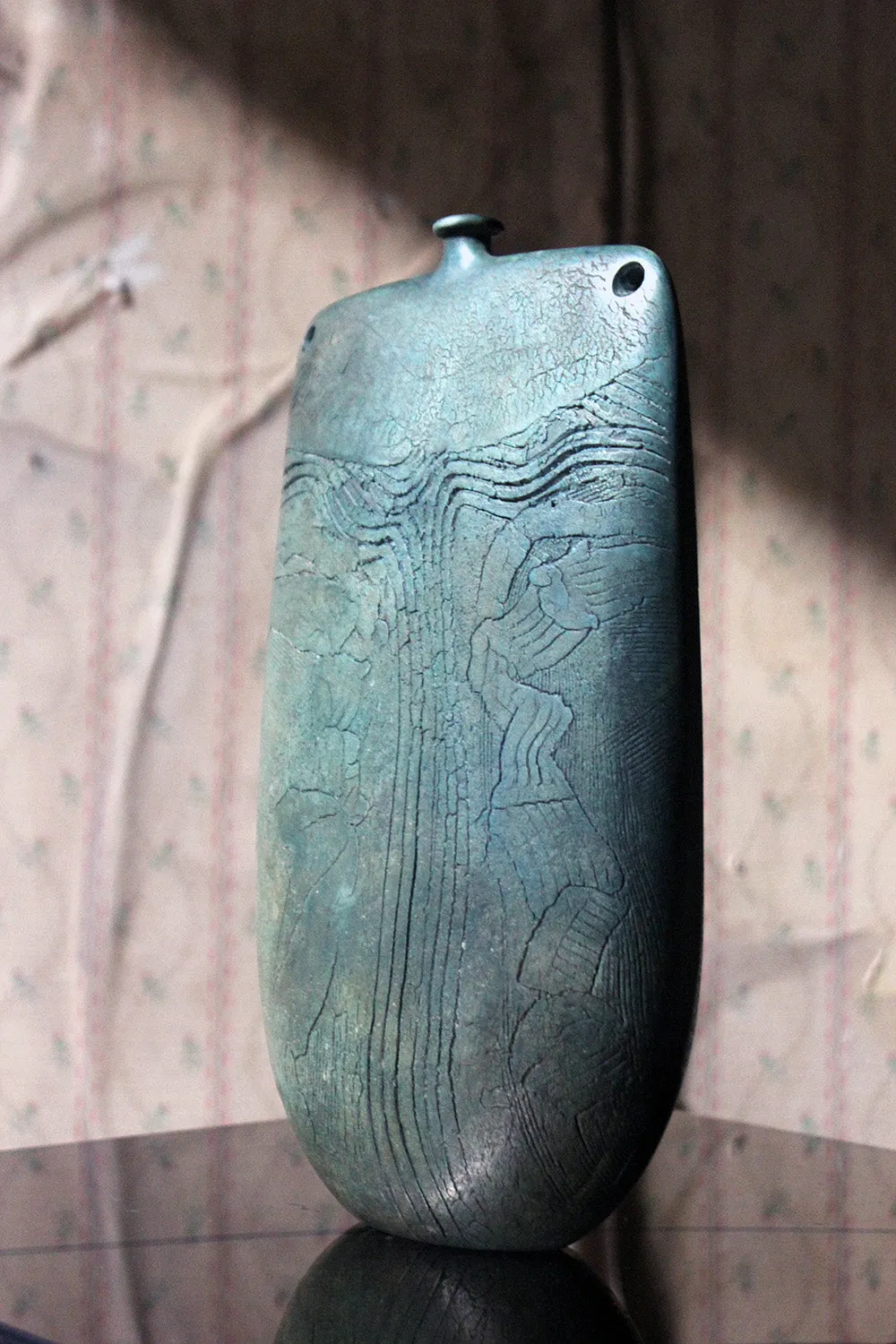 A Burnished Jade Green Bottle Vase by Peter Hayes c.1984