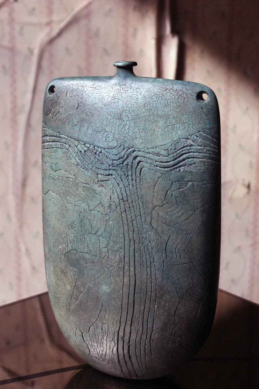A Burnished Jade Green Bottle Vase by Peter Hayes c.1984