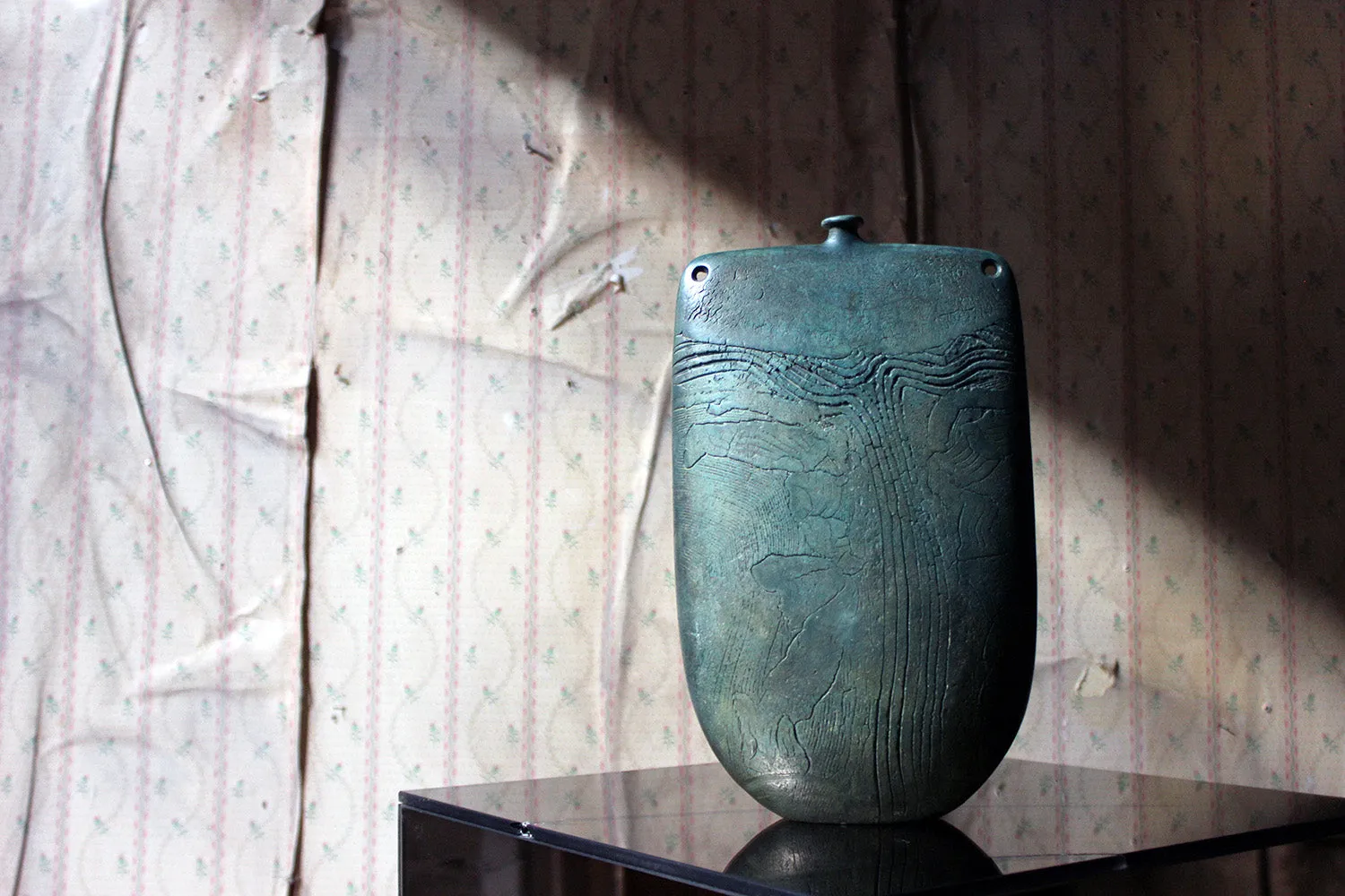 A Burnished Jade Green Bottle Vase by Peter Hayes c.1984