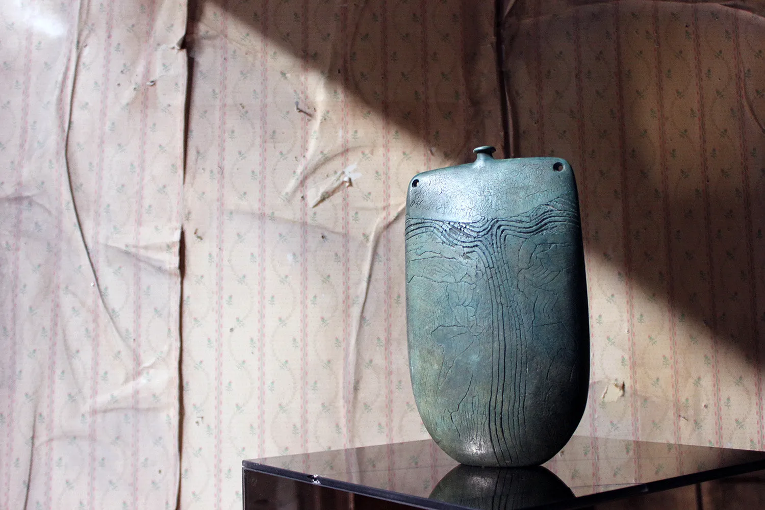 A Burnished Jade Green Bottle Vase by Peter Hayes c.1984