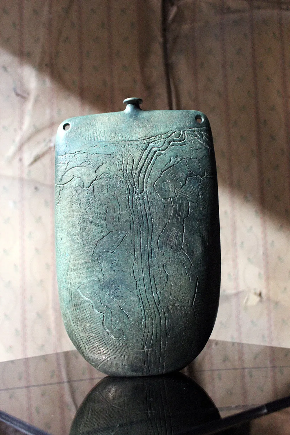 A Burnished Jade Green Bottle Vase by Peter Hayes c.1984