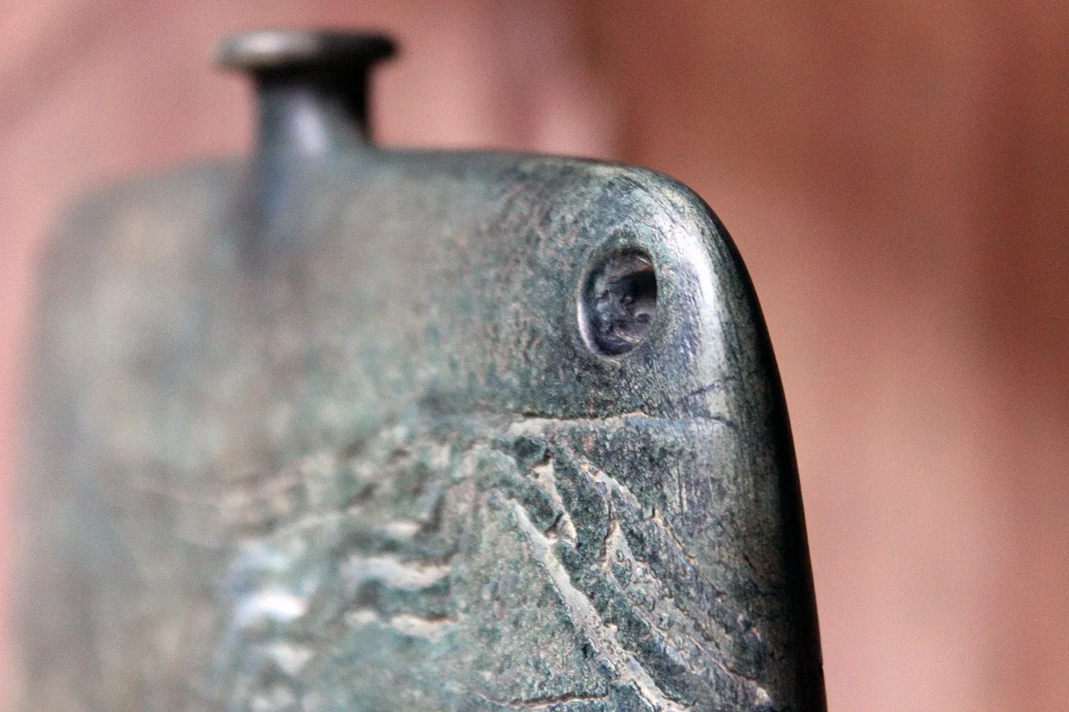 A Burnished Jade Green Bottle Vase by Peter Hayes c.1984