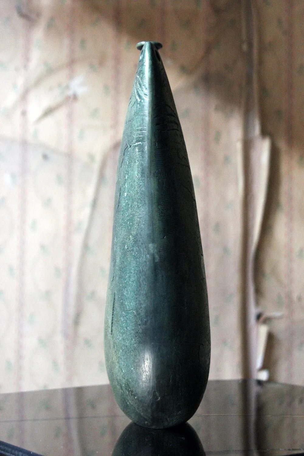 A Burnished Jade Green Bottle Vase by Peter Hayes c.1984