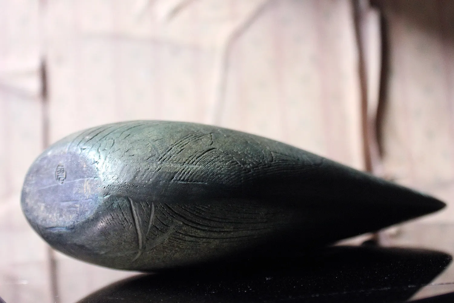 A Burnished Jade Green Bottle Vase by Peter Hayes c.1984