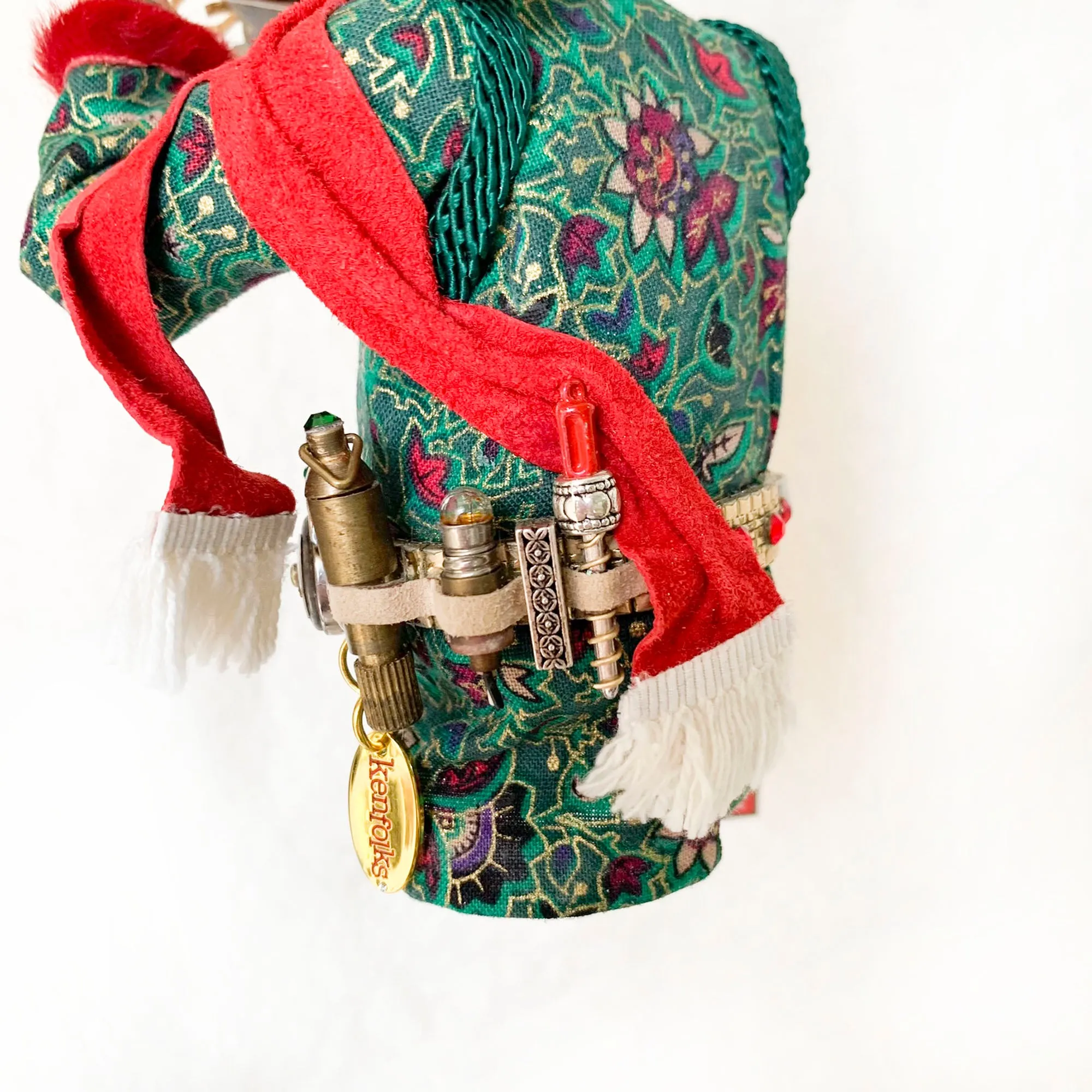 Christmas ornament - Spaceman Elf #443 inspecting a Ray Gun