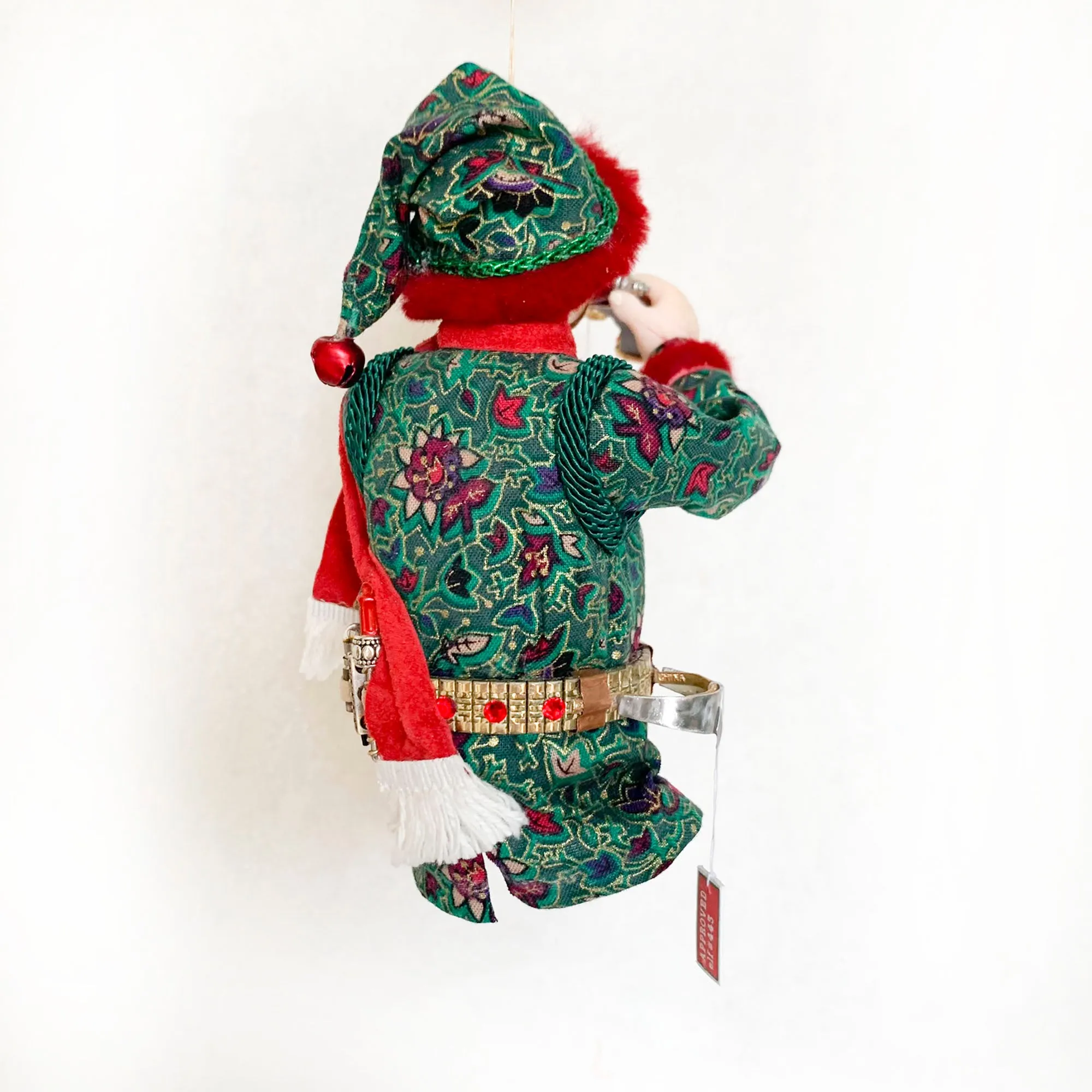 Christmas ornament - Spaceman Elf #443 inspecting a Ray Gun