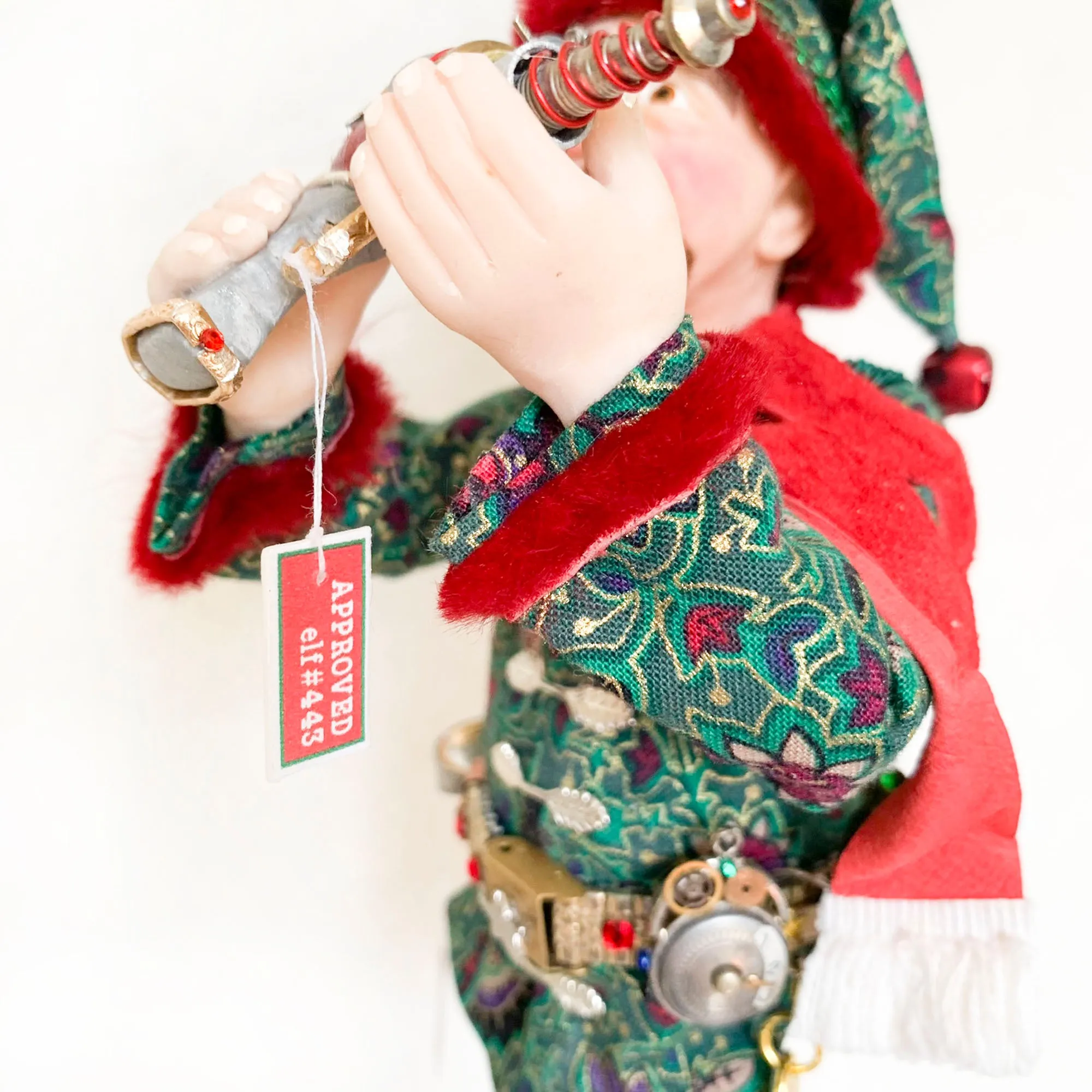 Christmas ornament - Spaceman Elf #443 inspecting a Ray Gun