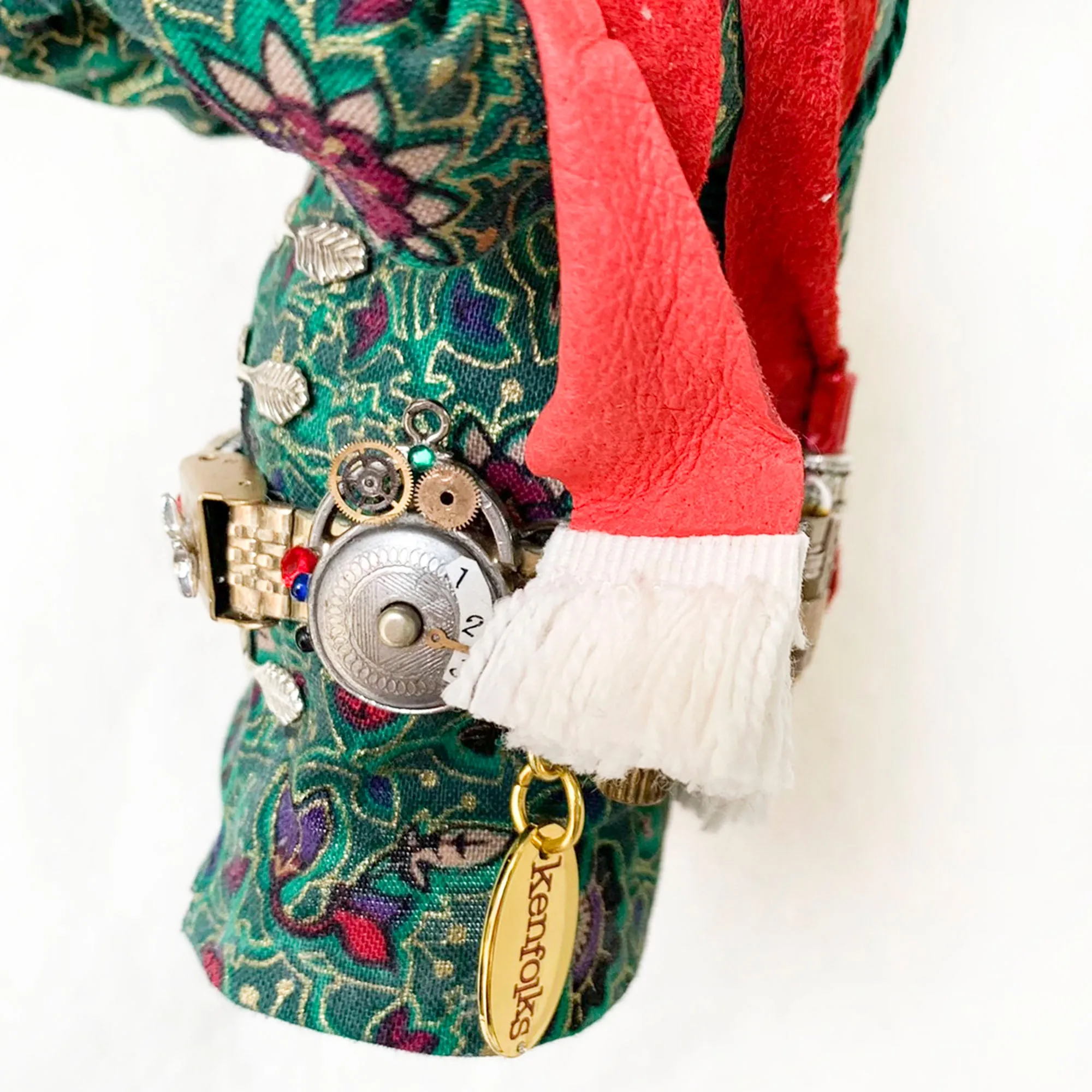 Christmas ornament - Spaceman Elf #443 inspecting a Ray Gun