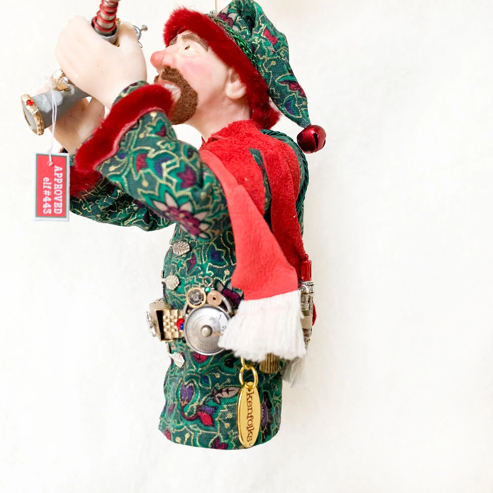 Christmas ornament - Spaceman Elf #443 inspecting a Ray Gun