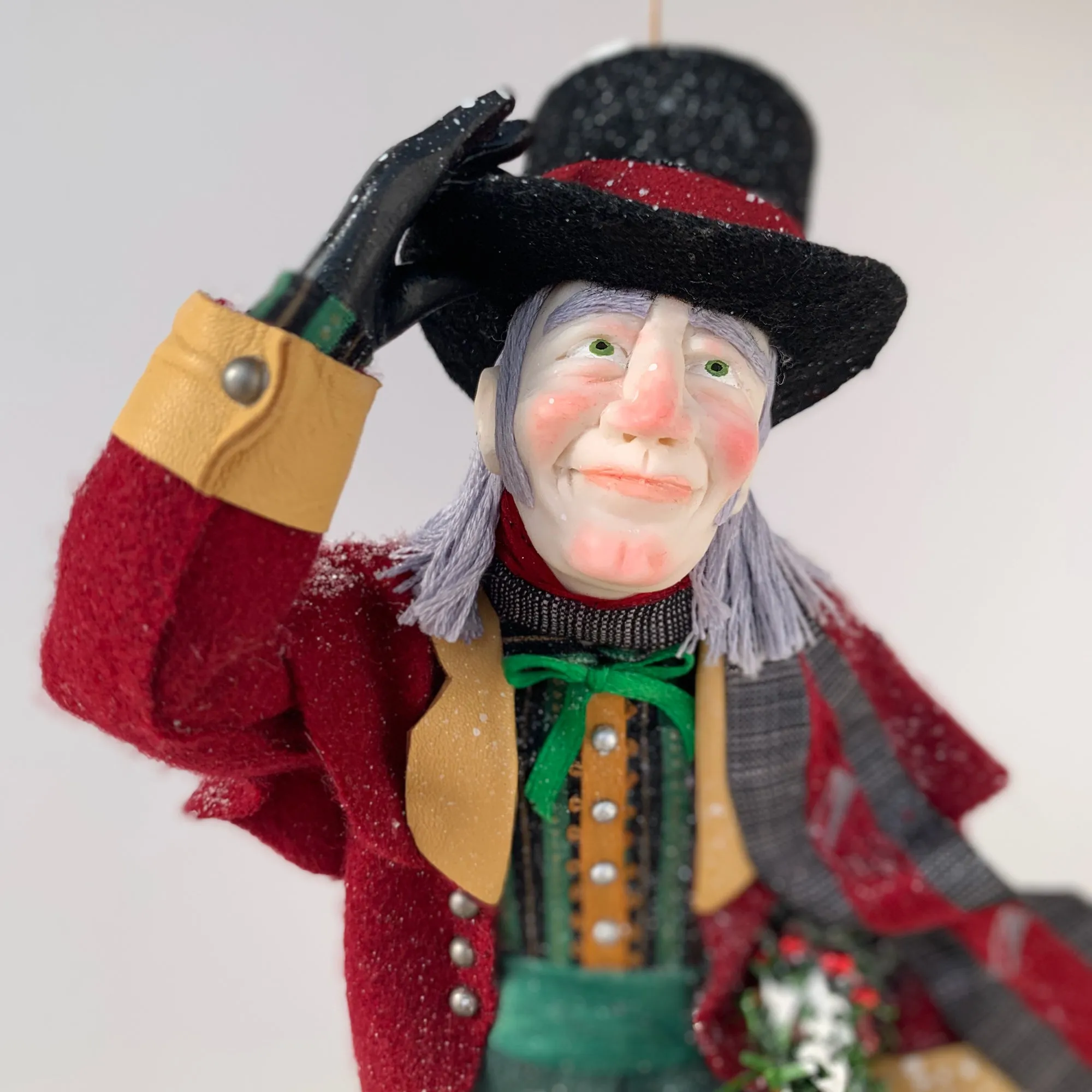 Happy Scrooge carrying a Christmas wreath and tipping his Top Hat - Dickens Collectable Christmas Decoration - Sculpture by Ken Fedoruk