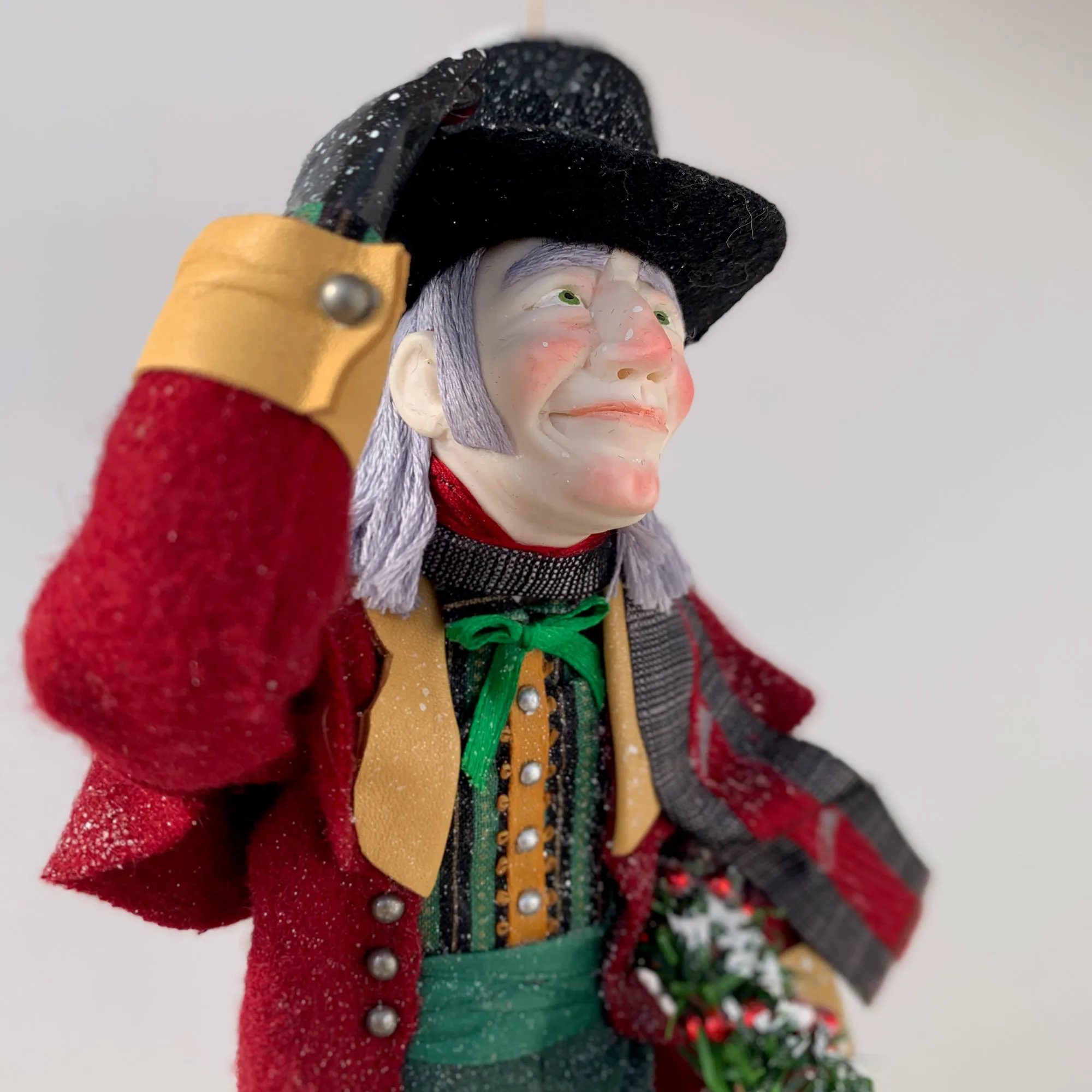 Happy Scrooge carrying a Christmas wreath and tipping his Top Hat - Dickens Collectable Christmas Decoration - Sculpture by Ken Fedoruk