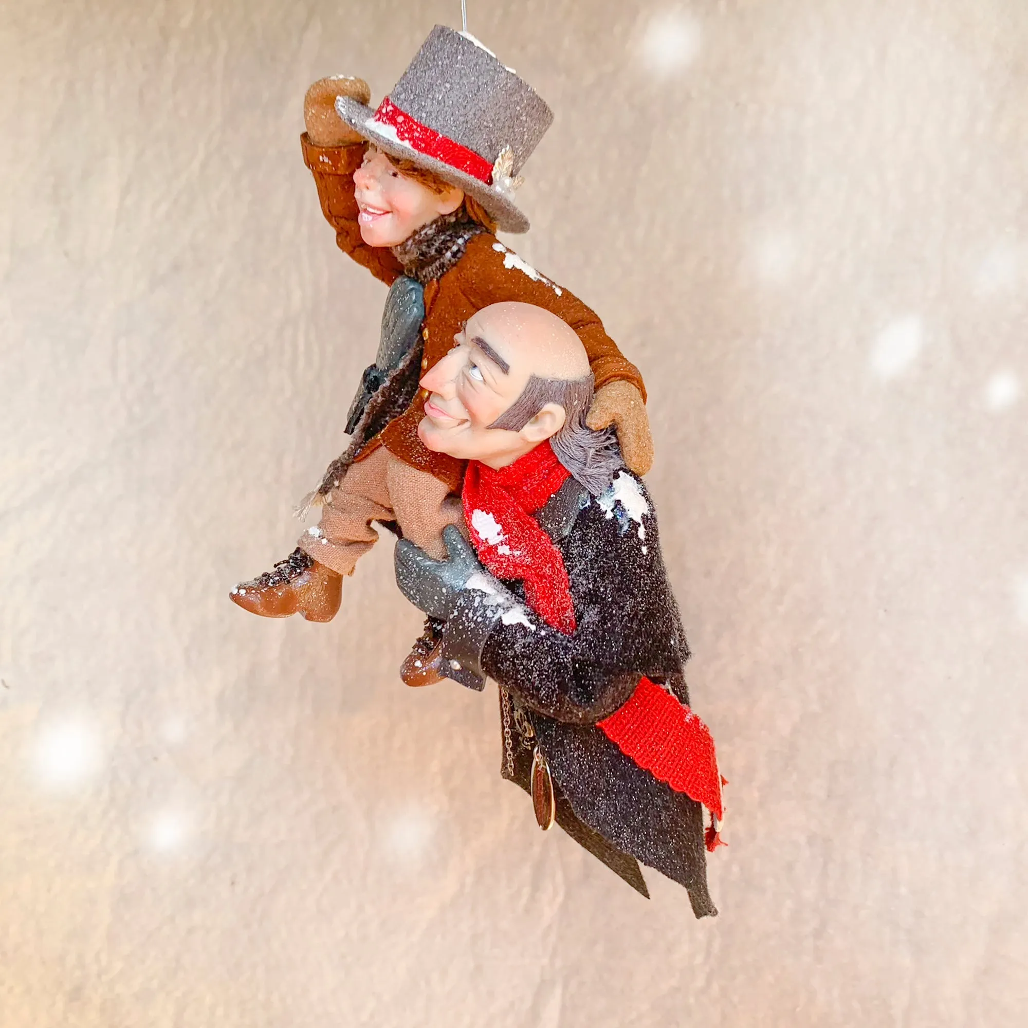 Scrooge a new man with Tiny Tim on his shoulder - Hanging Christmas Ornament