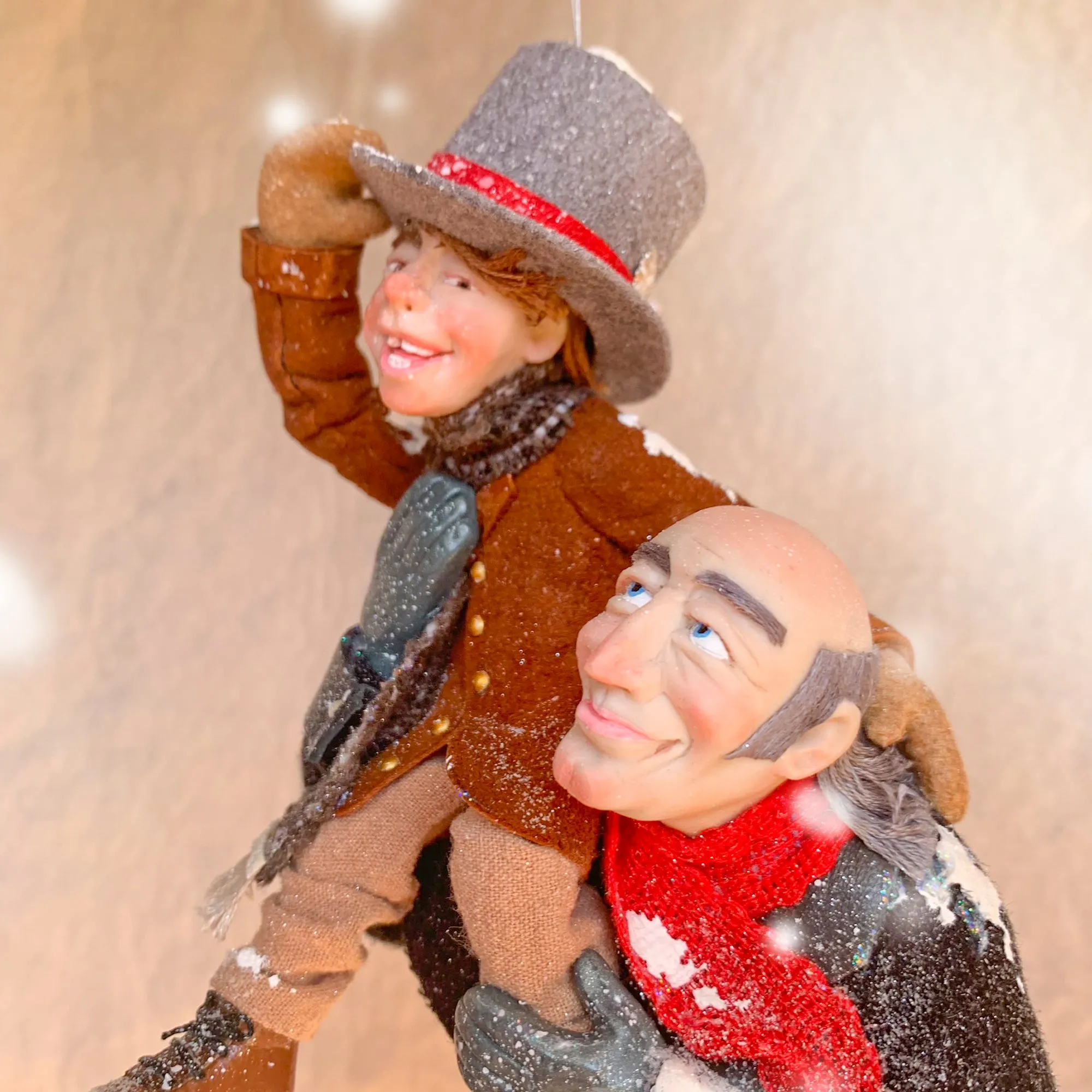 Scrooge a new man with Tiny Tim on his shoulder - Hanging Christmas Ornament