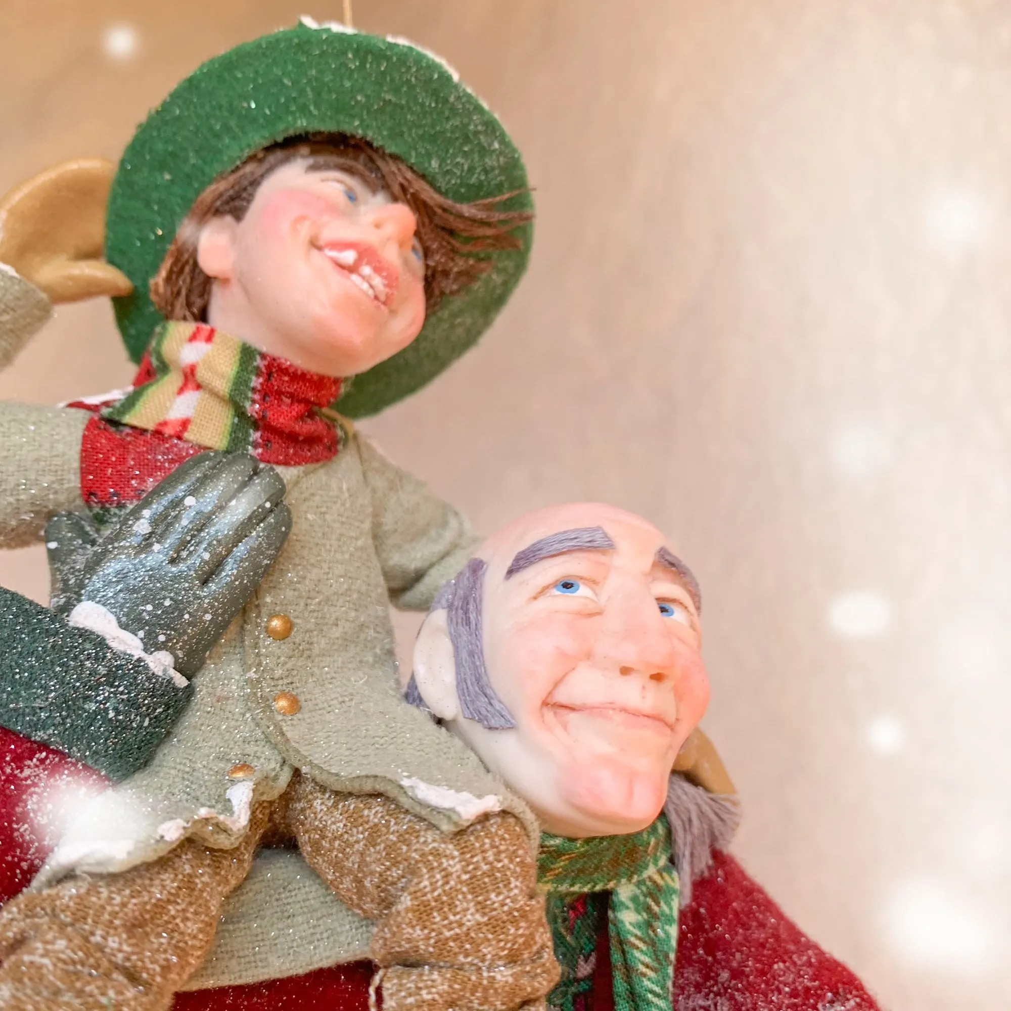 Scrooge a new man with Tiny Tim on his shoulder - Hanging Christmas Ornament