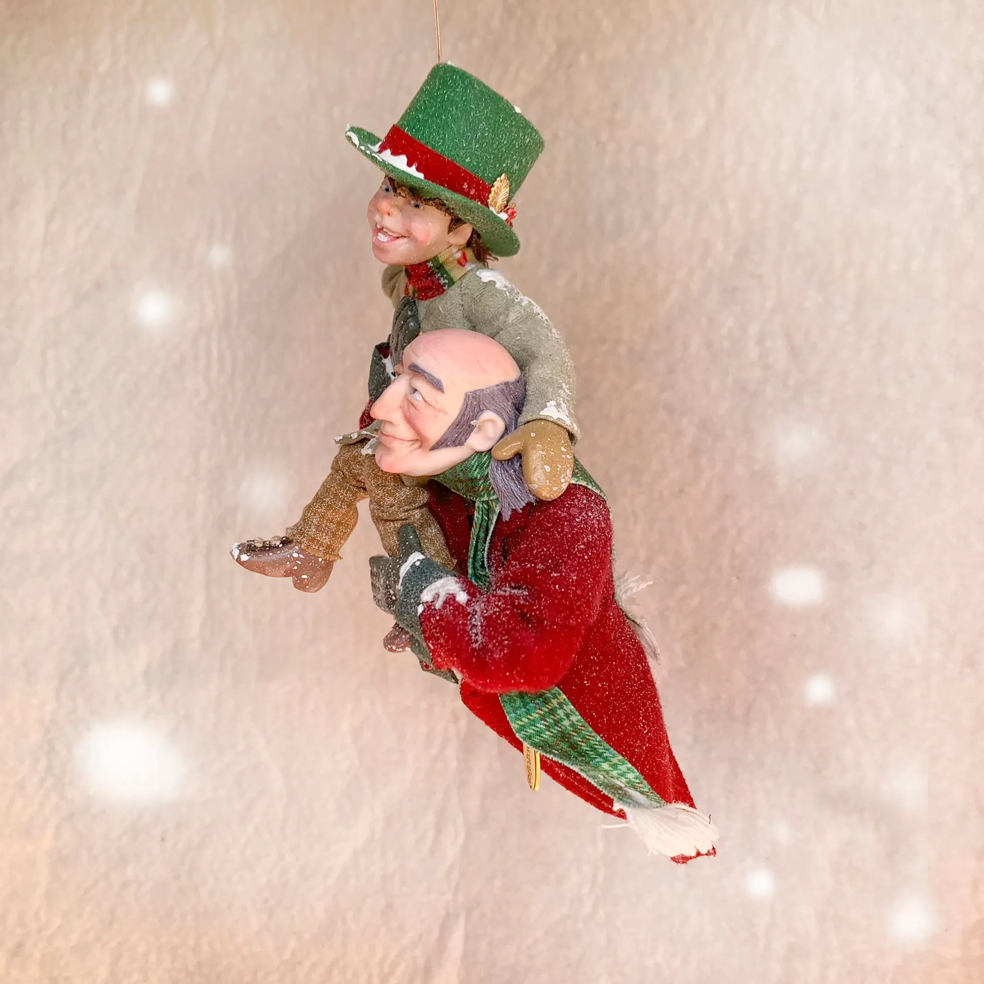 Scrooge a new man with Tiny Tim on his shoulder - Hanging Christmas Ornament