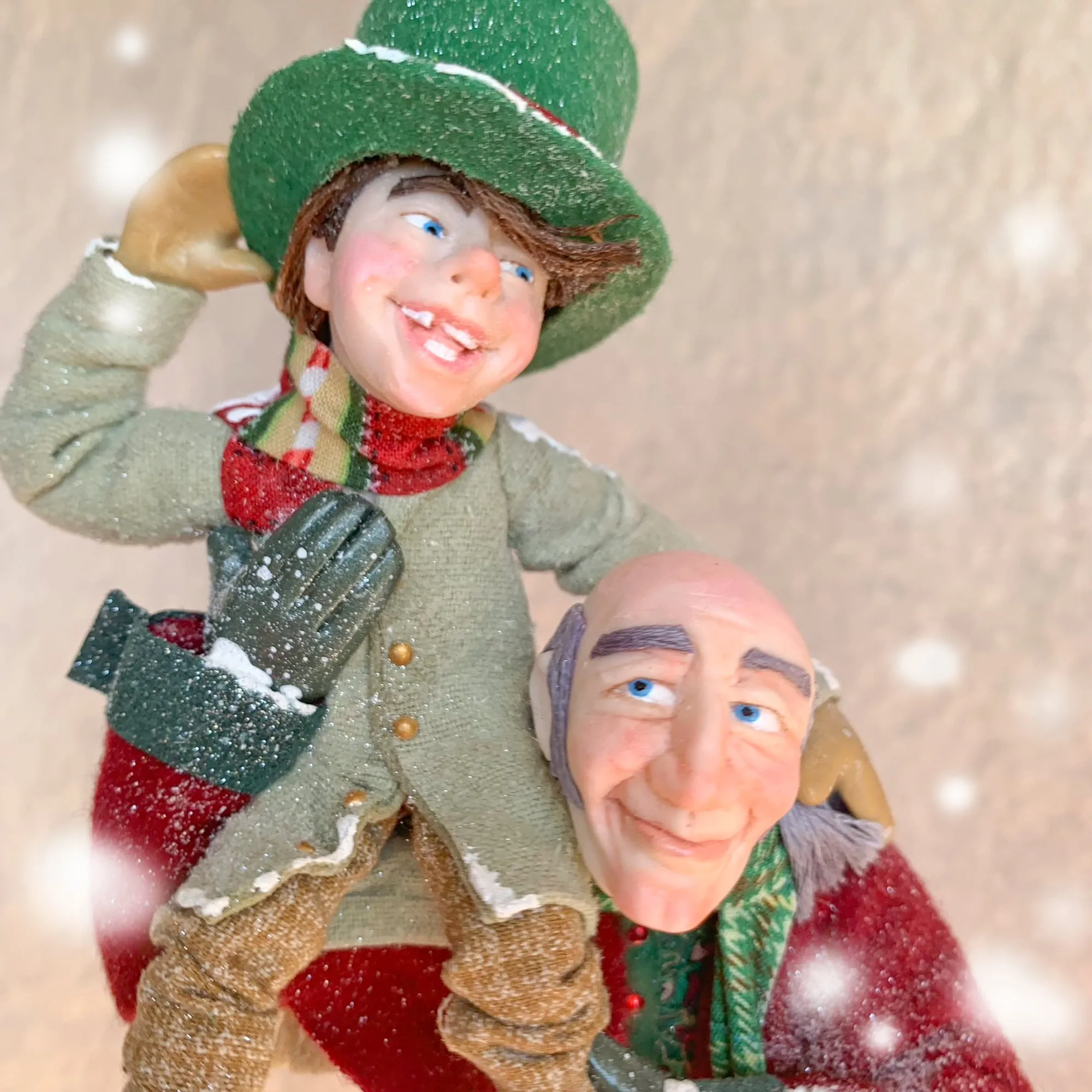 Scrooge a new man with Tiny Tim on his shoulder - Hanging Christmas Ornament