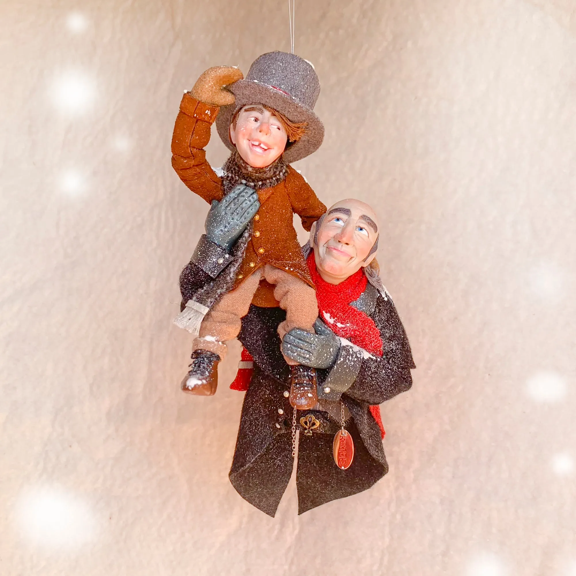 Scrooge a new man with Tiny Tim on his shoulder - Hanging Christmas Ornament