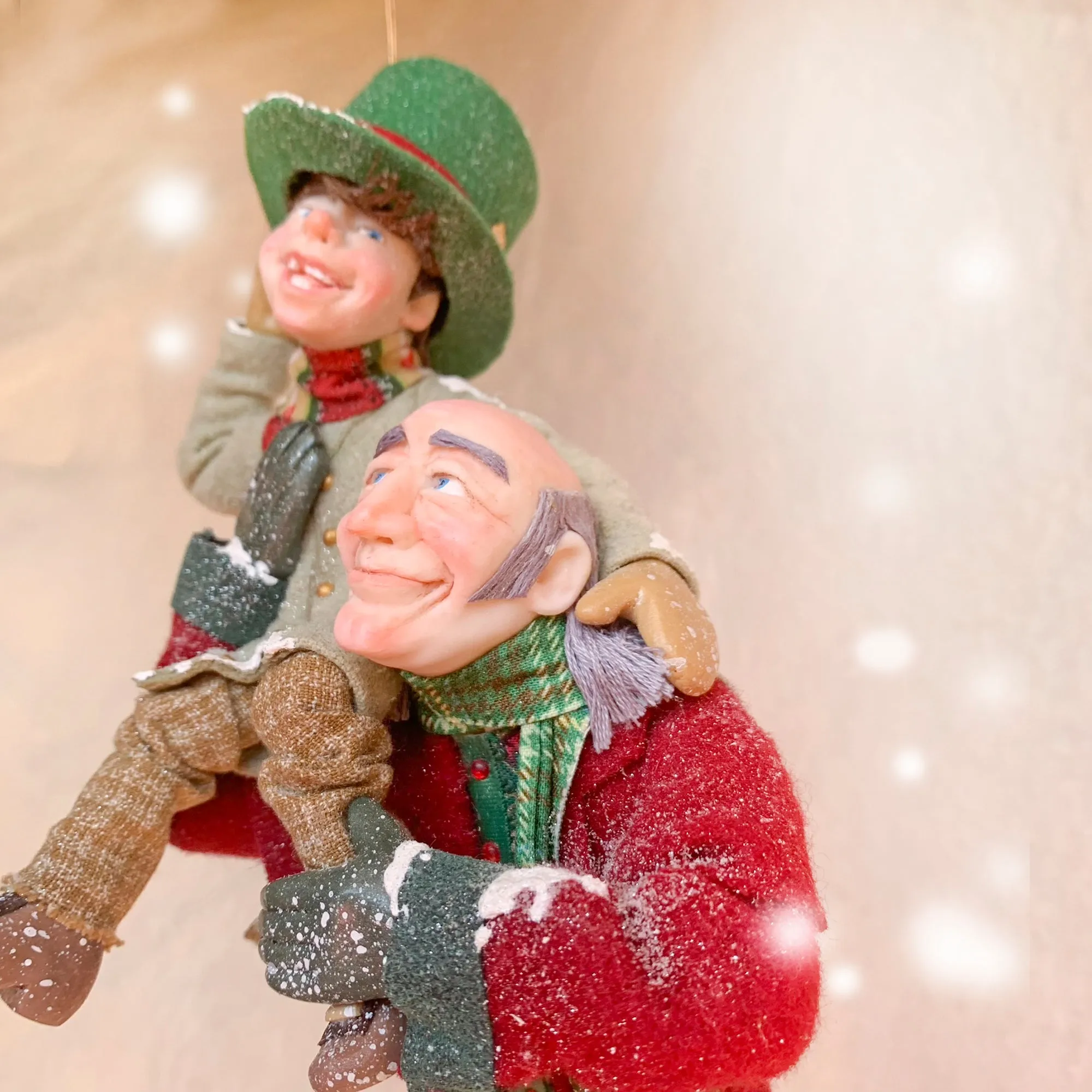 Scrooge a new man with Tiny Tim on his shoulder - Hanging Christmas Ornament